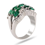 Curving Emerald Ribbon Ring