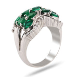 Curving Emerald Ribbon Ring